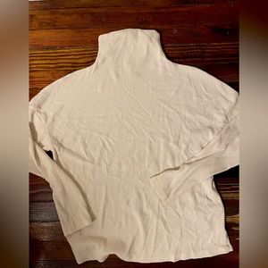 White turtleneck sweater
